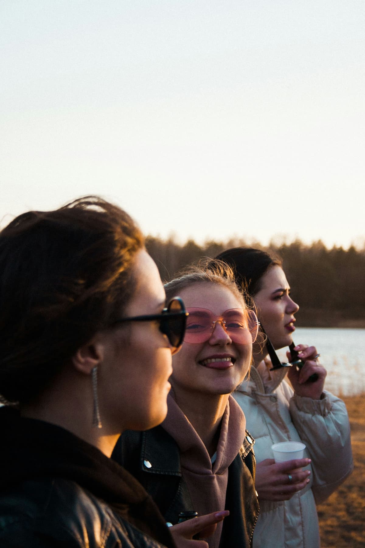 Adolescents look at sunset